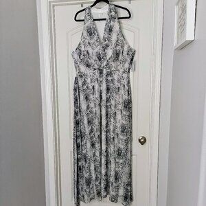 NJ COLLECTION Chiffon Maxi Dress with a Halter Neckline and Tie-Back Closure.